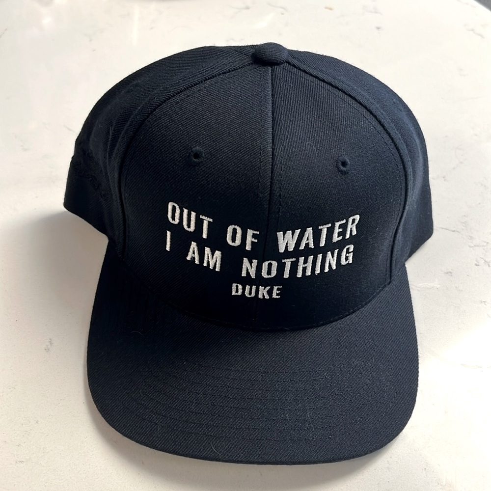Aloha Modern SnapBack black cap- Duke Kahanamoku “out to water I am nothing”